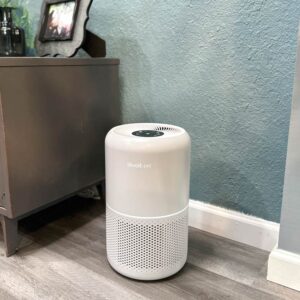 HEPA air filter standing on floor in room