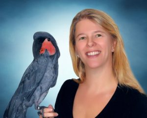 Dr. Heather Barron posed with parrot