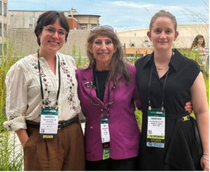 Dr. Pepperberg poses with other scientists