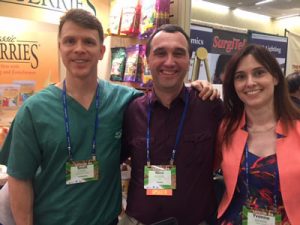 Dr. Scott Echols with Drs. Nico Schoemaker and Yvonne Van Zeeland at the Lafeber booth at ExoticsCon in Portland, Oregon.