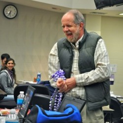 Dr. Jim Carpenter of Kansas State University ‘loads up’ on beads provided by Dr. Rich.