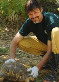 Dr. Paul Gibbons with tortoise.