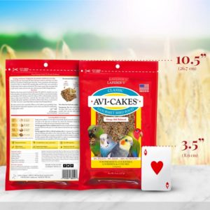 package of Classic Avi-Cakes for small birds beside playing card to compare size